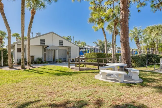 an aerial view of a house with a lake view