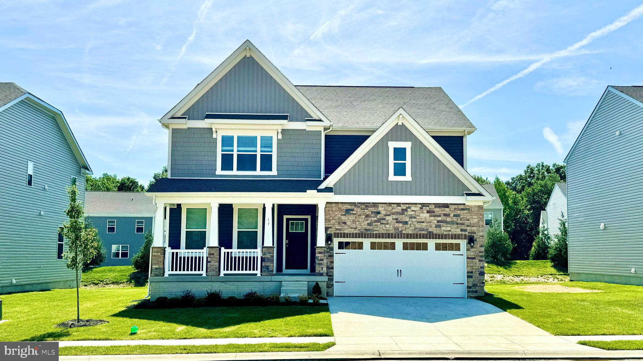 28 Country Living Road Elkton, MD 21921 - Photo 1 of 48 a front view of a house with a yard