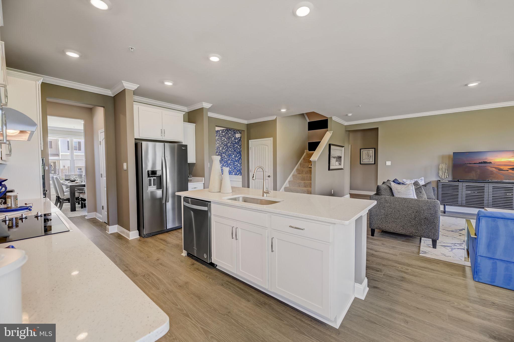 28 Country Living Road Elkton, MD 21921 - Photo 13 of 48 a large white kitchen with stainless steel appliances