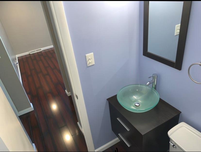 519 Idlewood Road Pittsburgh, PA 15235 - Photo 16 of 25 Main floor bathroom leading to hallway