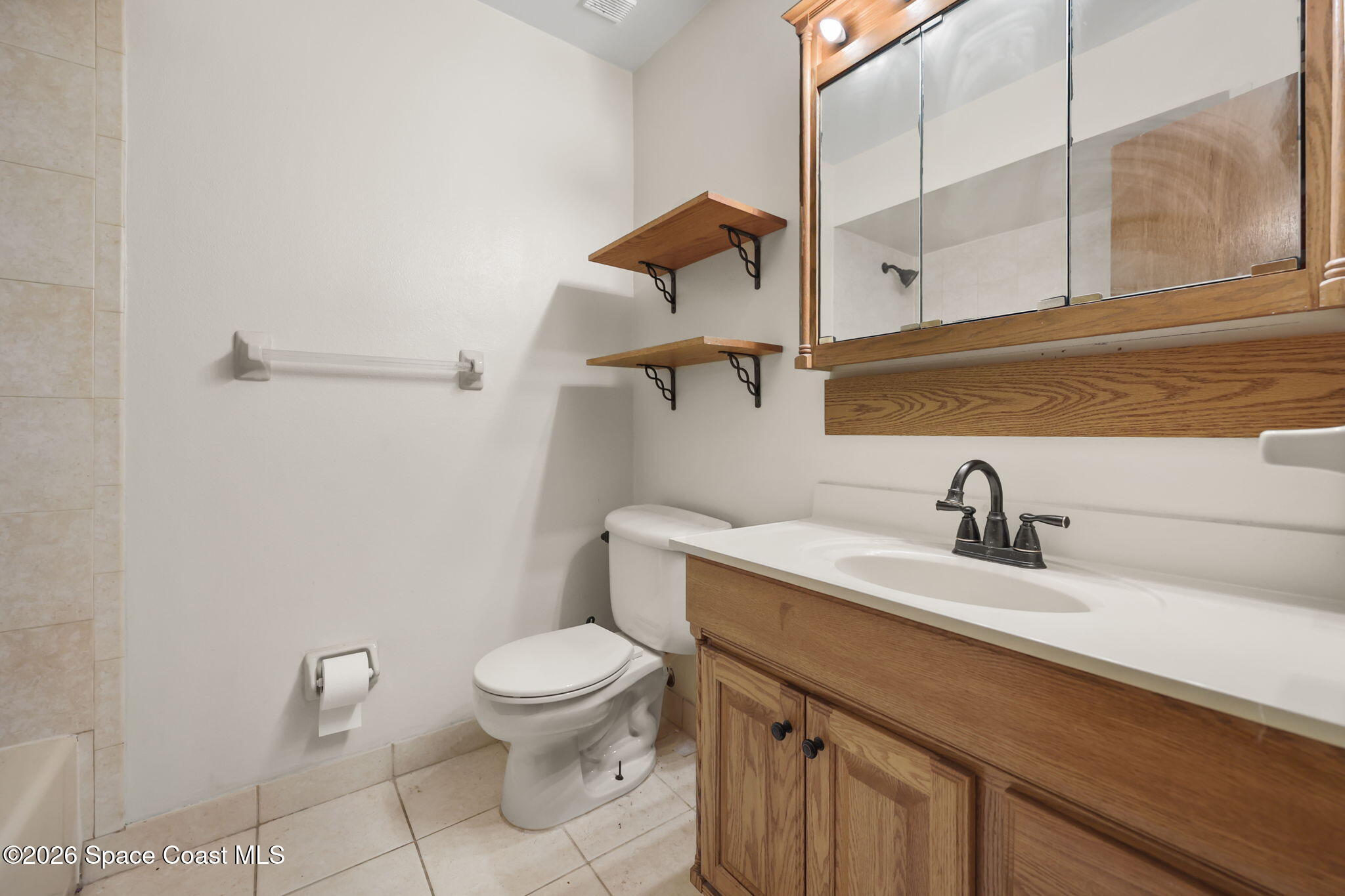 7256 Bright Avenue Cocoa, FL 32927 - Photo 15 of 29 Primary bath