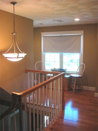 6 Colby Road Danvers, MA 01923 - Photo 17 of 21 a view of a balcony with furniture and wooden floor