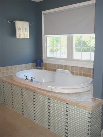 6 Colby Road Danvers, MA 01923 - Photo 21 of 21 a bathroom with a bathtub