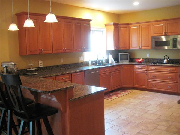 6 Colby Road Danvers, MA 01923 - Photo 7 of 21 a kitchen with a sink cabinets and window