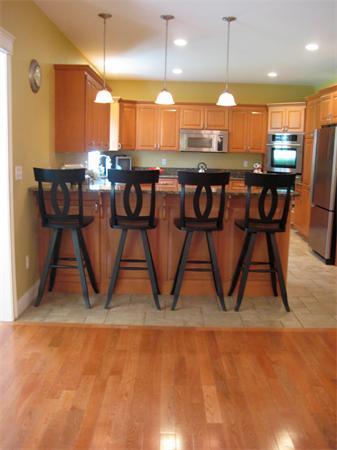 6 Colby Road Danvers, MA 01923 - Photo 10 of 21 a view of kitchen with stainless steel appliances kitchen island granite countertop dining table chair and a granite counter top