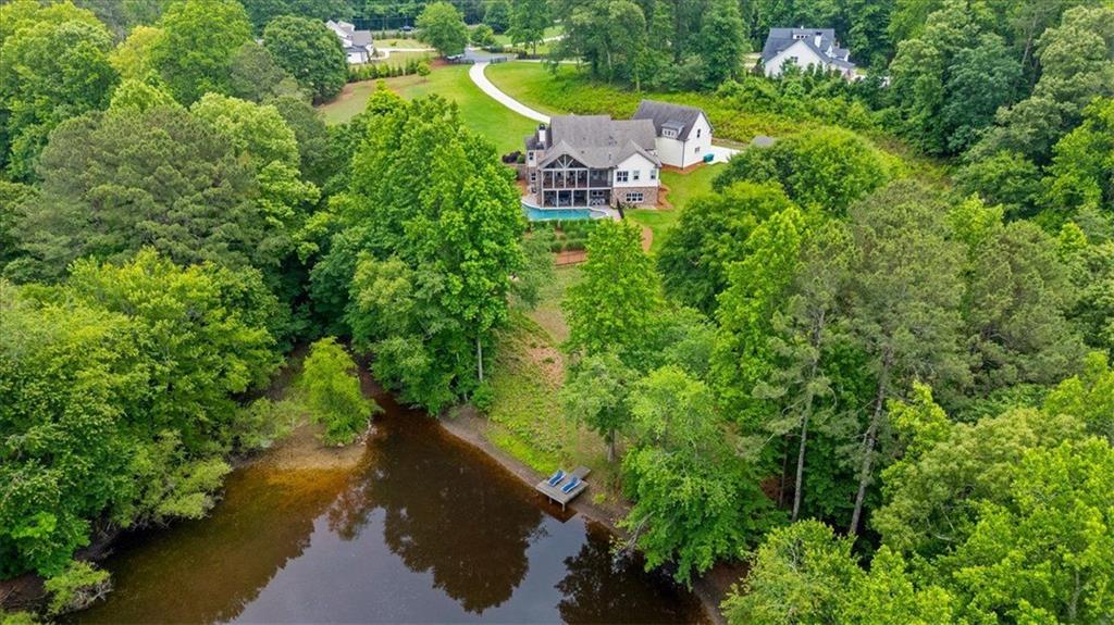 2503 Sugar Pike Road Canton, GA 30115 - Photo 31 of 134 an aerial view of a house with a yard and lake view