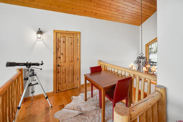 a view of a livingroom with furniture and furniture