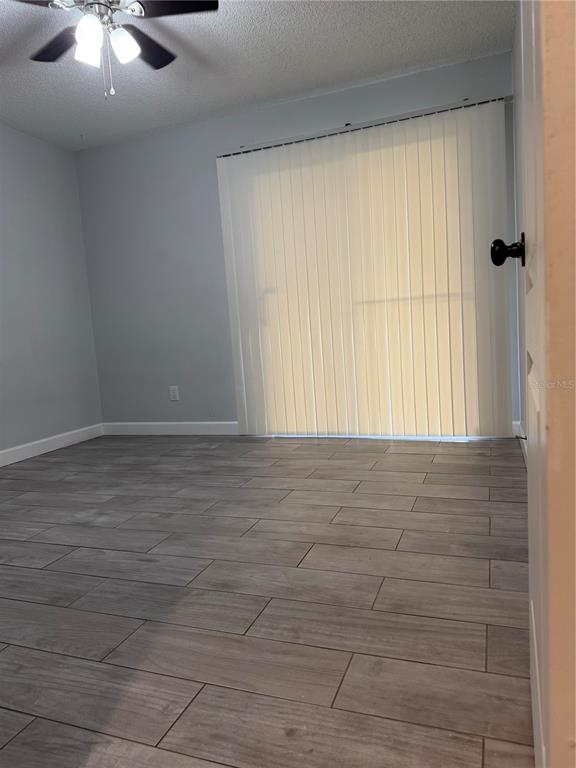 2701 Northeast 10th Street, Unit 802 Ocala, FL 34470 - Photo 11 of 16 a view of an empty room with a window