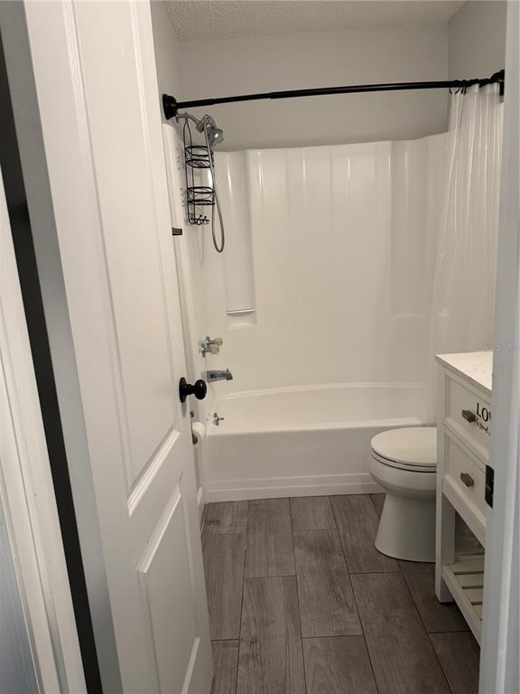 2701 Northeast 10th Street, Unit 802 Ocala, FL 34470 - Photo 6 of 16 a bathroom with a toilet and a shower