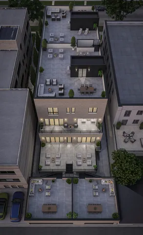 a kitchen with granite countertop a stove and a view of living room