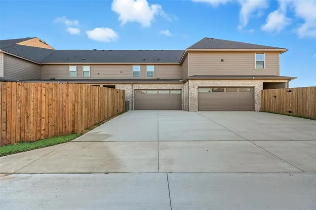 an aerial view of a pool patio swimming pool and outdoor seating