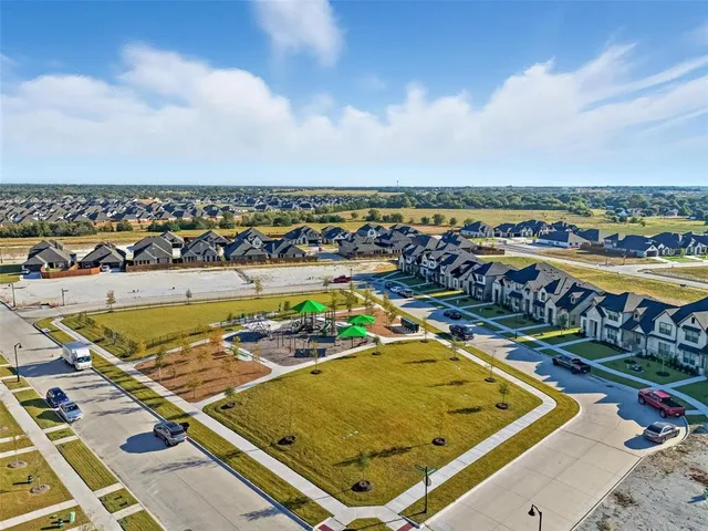 a swimming pool with wooden fence