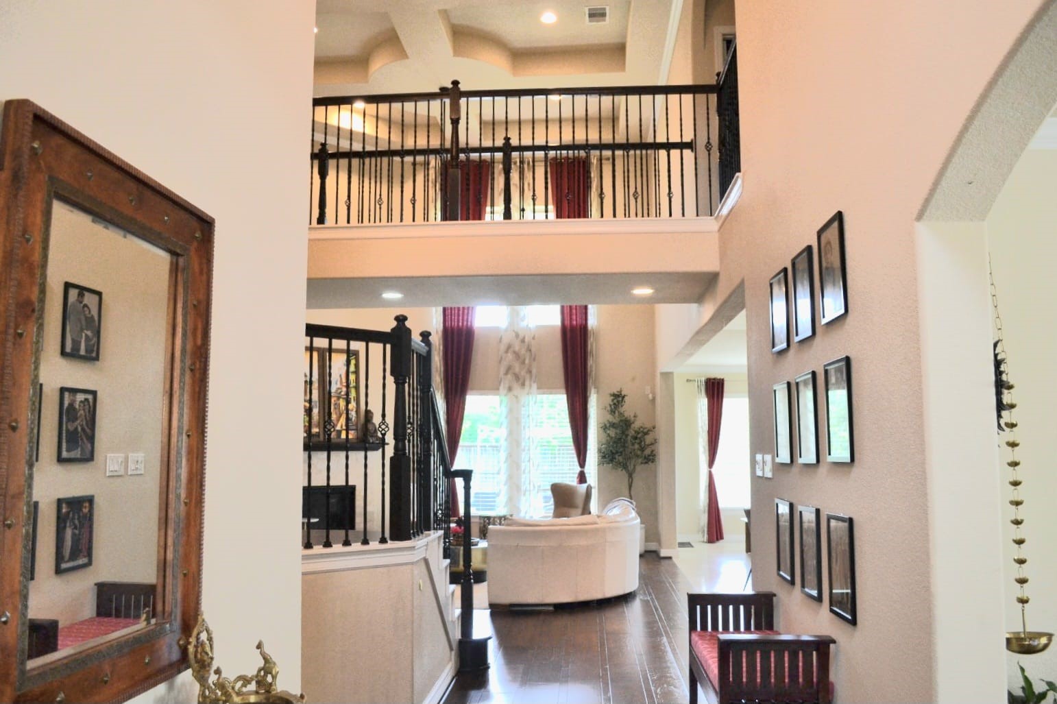 5206 Jacob Ridge Court Sugar Land, TX 77479 - Photo 4 of 42 a view of staircase with furniture and floor to ceiling window