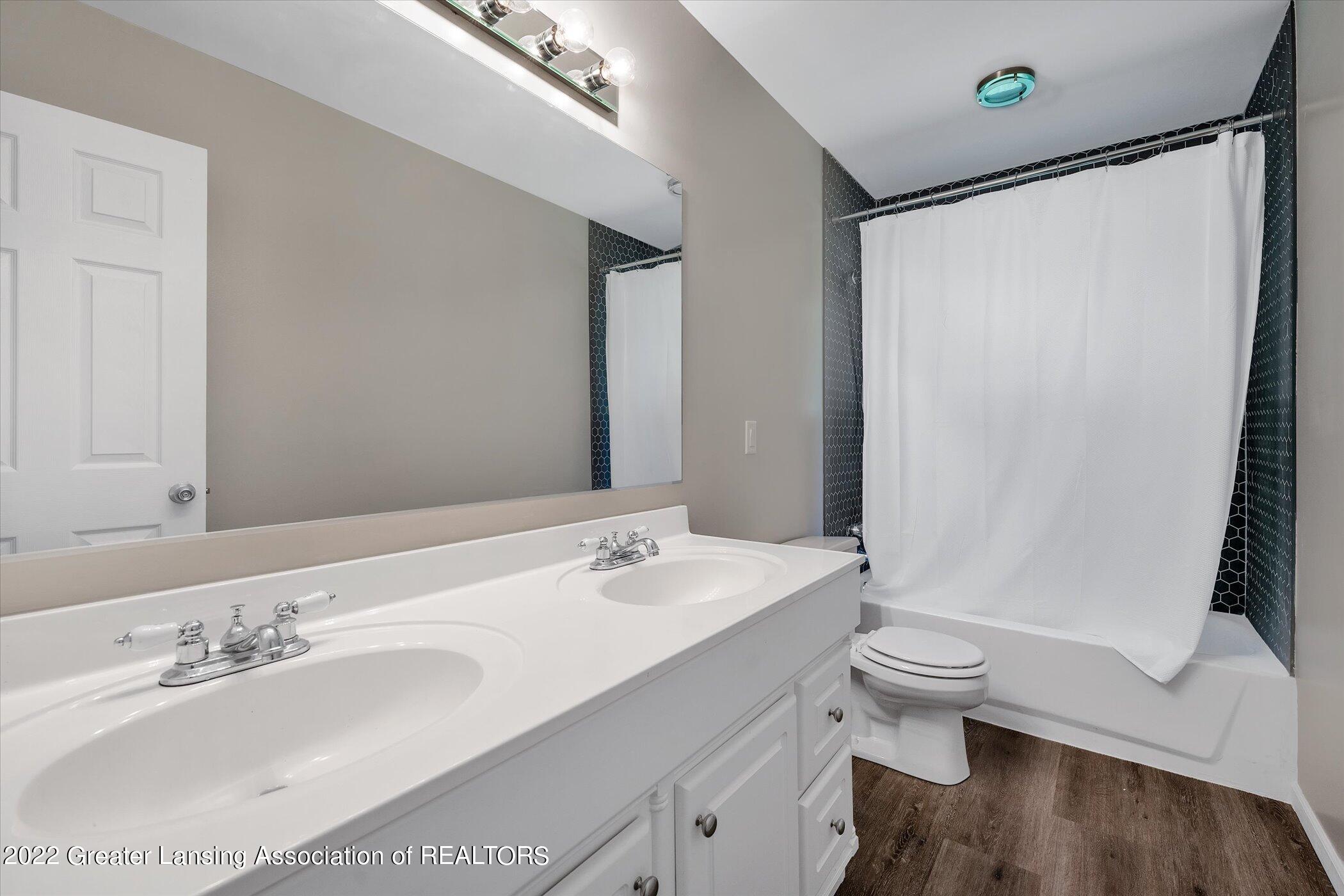 3025 Colchester Road Lansing, MI 48906 - Photo 21 of 35 21-3025-Colchester-Rd-WindowStill-Real-E