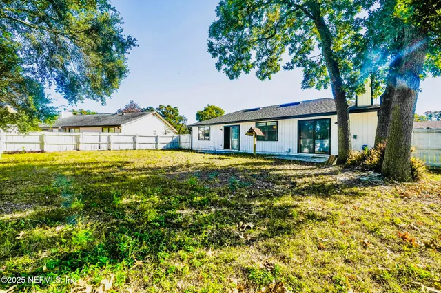 a view of a swimming pool with an outdoor space