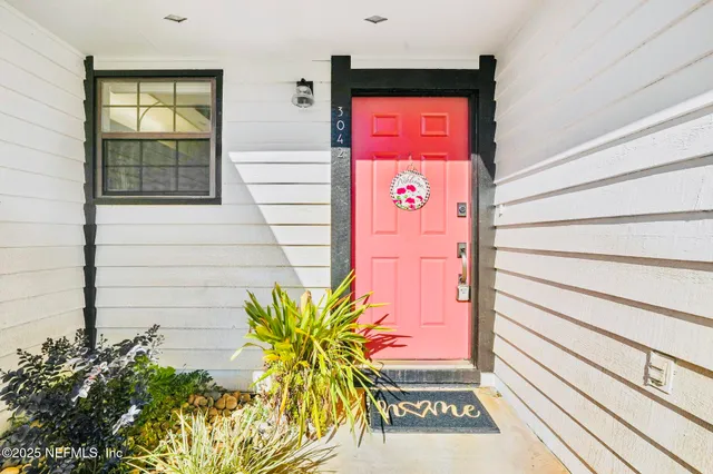 a sign that is on a brick wall