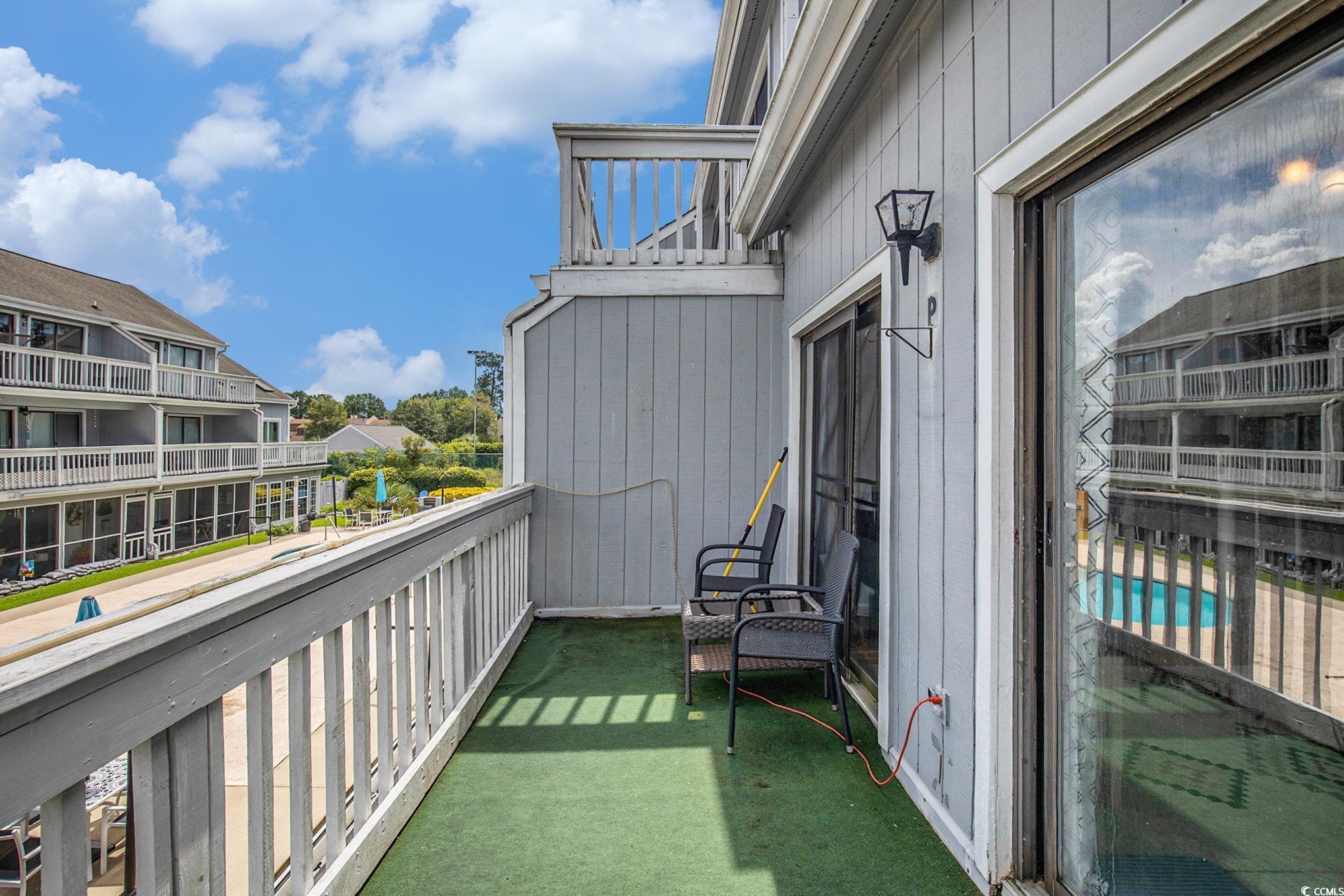 3700 Golf Colony Lane, Unit 14P Little River, SC 29566 - Photo 26 of 30 Balcony with view of pool
