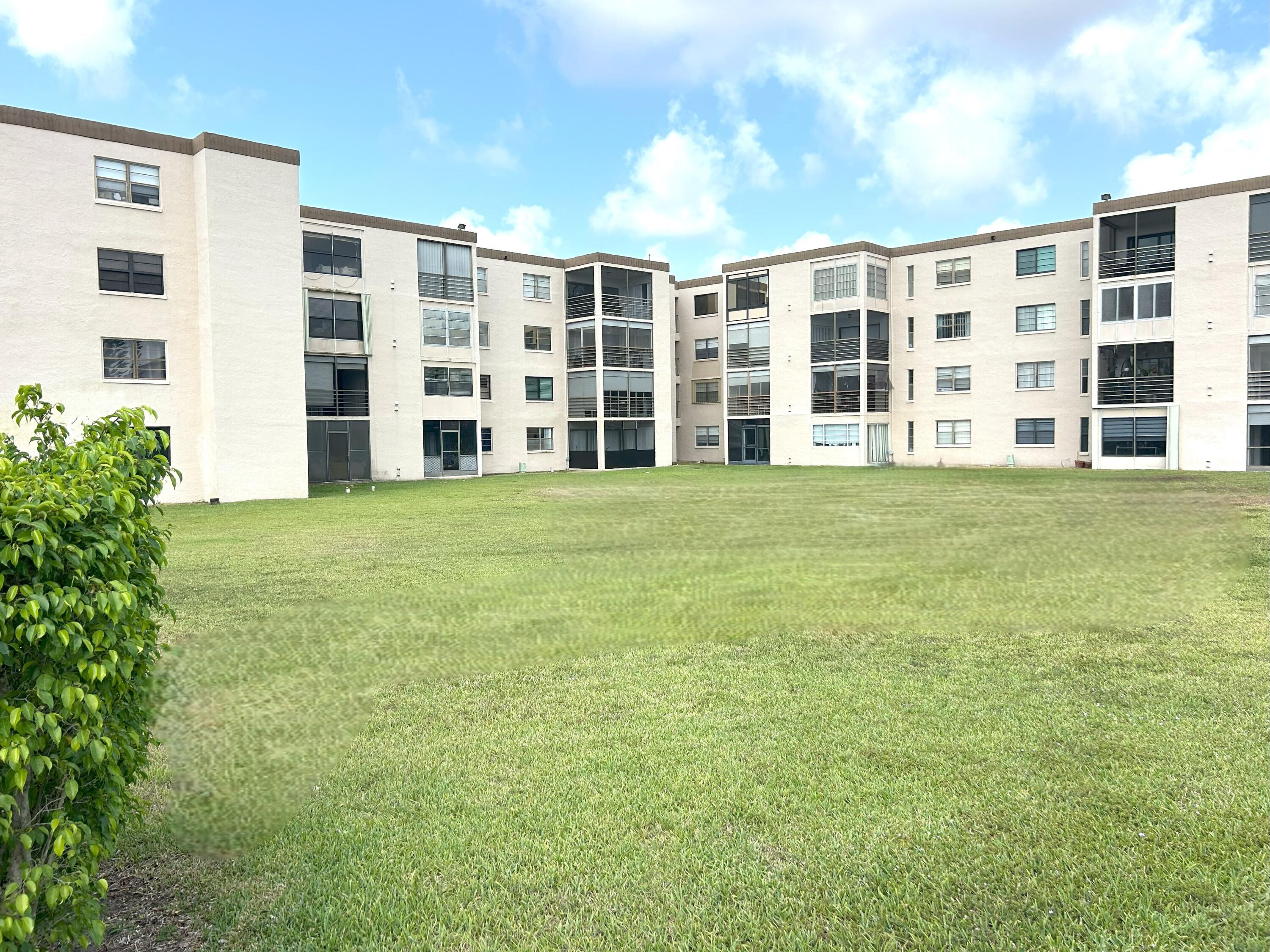 9300 Southwest 8th Street, Unit 216 Boca Raton, FL 33428 - Photo 27 of 31 Rear / Grounds