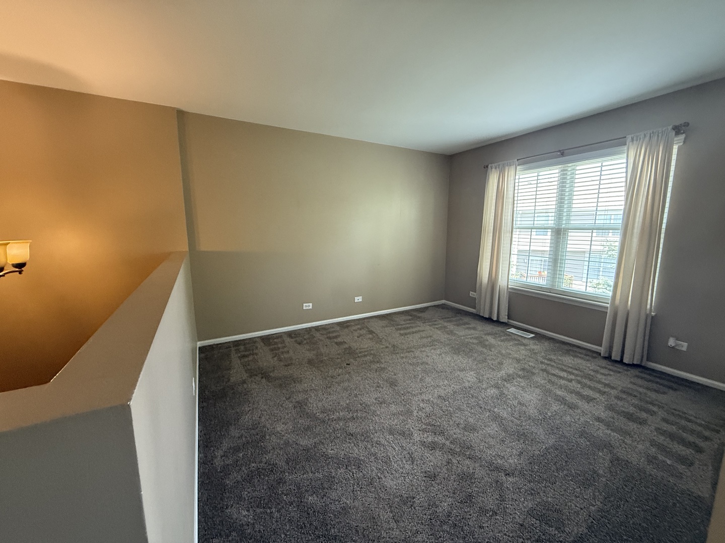 2340 Hudson Circle Aurora, IL 60502 - Photo 19 of 37 an empty room with windows