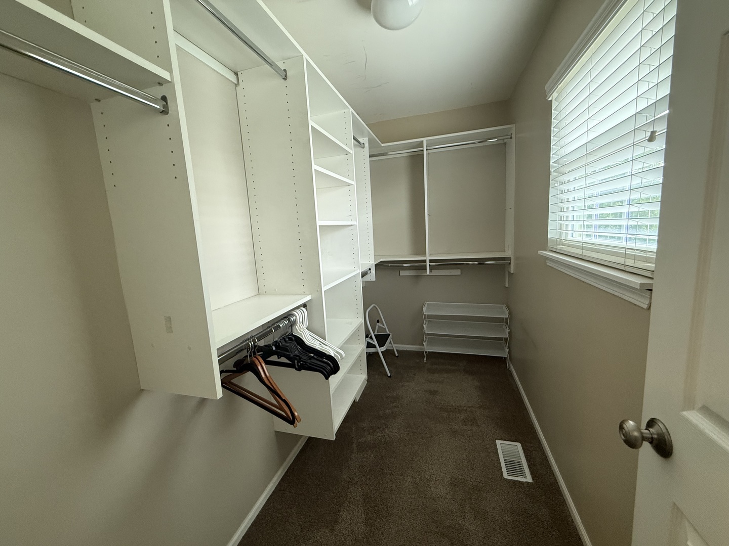 2340 Hudson Circle Aurora, IL 60502 - Photo 22 of 37 a storage room with wooden floor