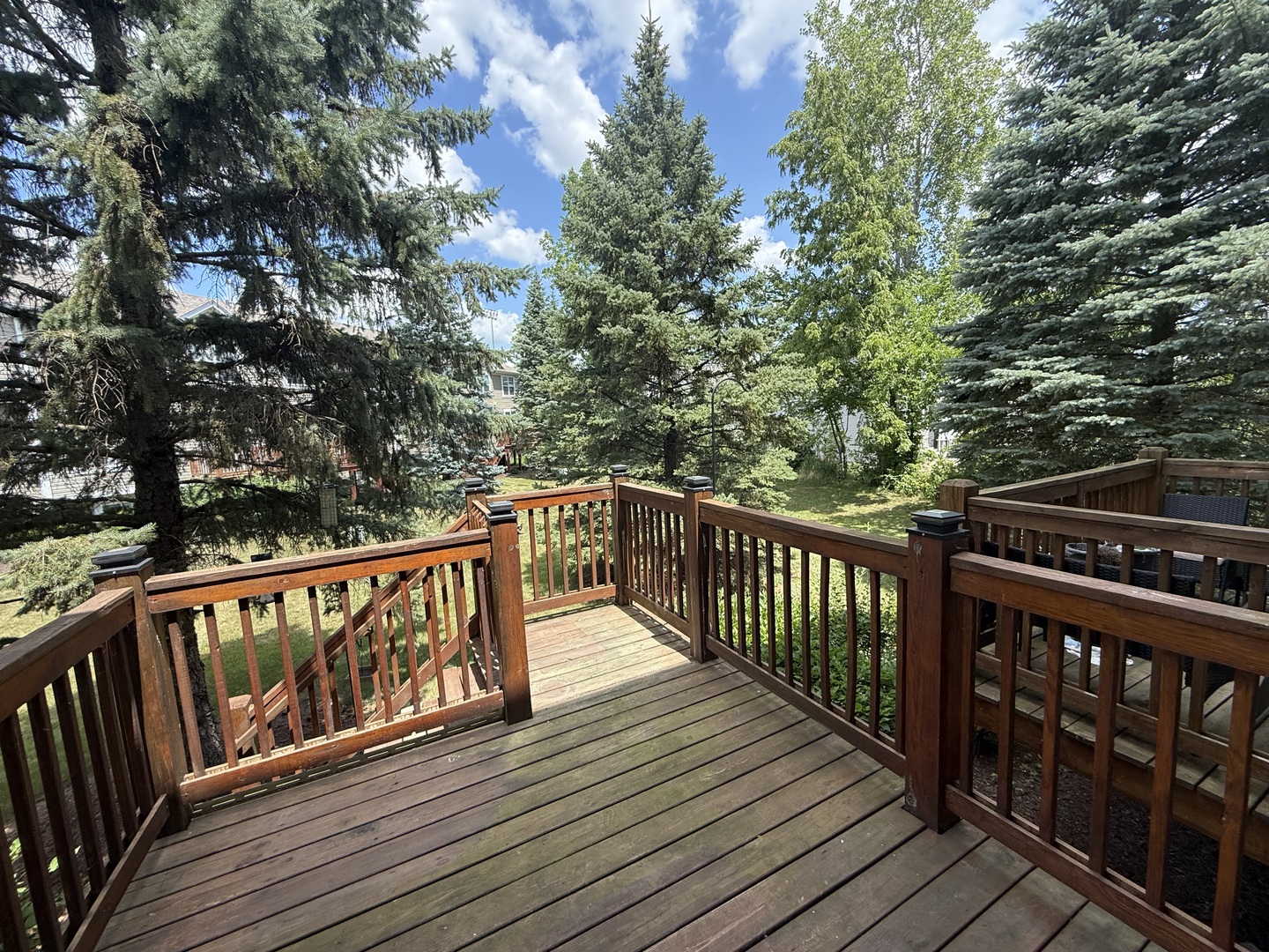 2340 Hudson Circle Aurora, IL 60502 - Photo 29 of 37 a view of deck with wooden floor and fence