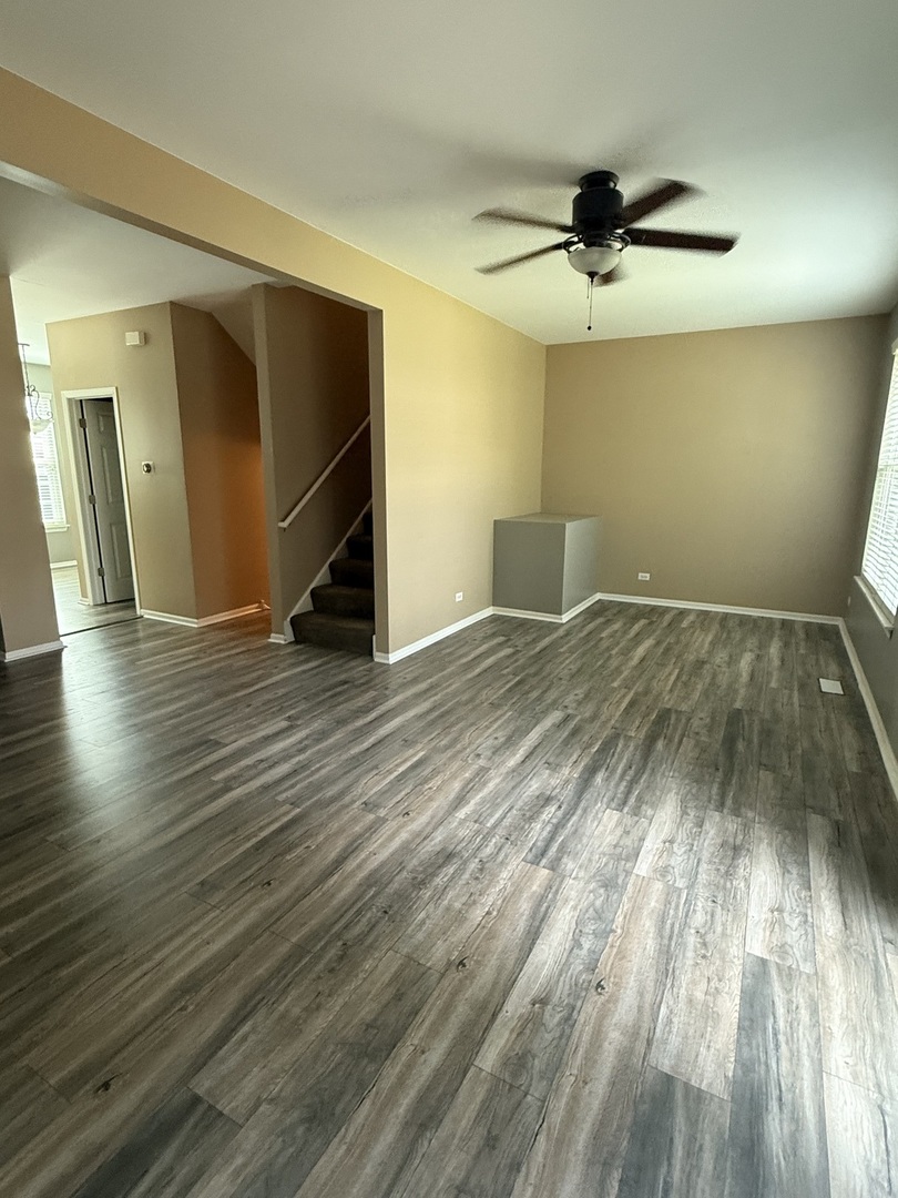 2340 Hudson Circle Aurora, IL 60502 - Photo 3 of 37 wooden floor in an empty room