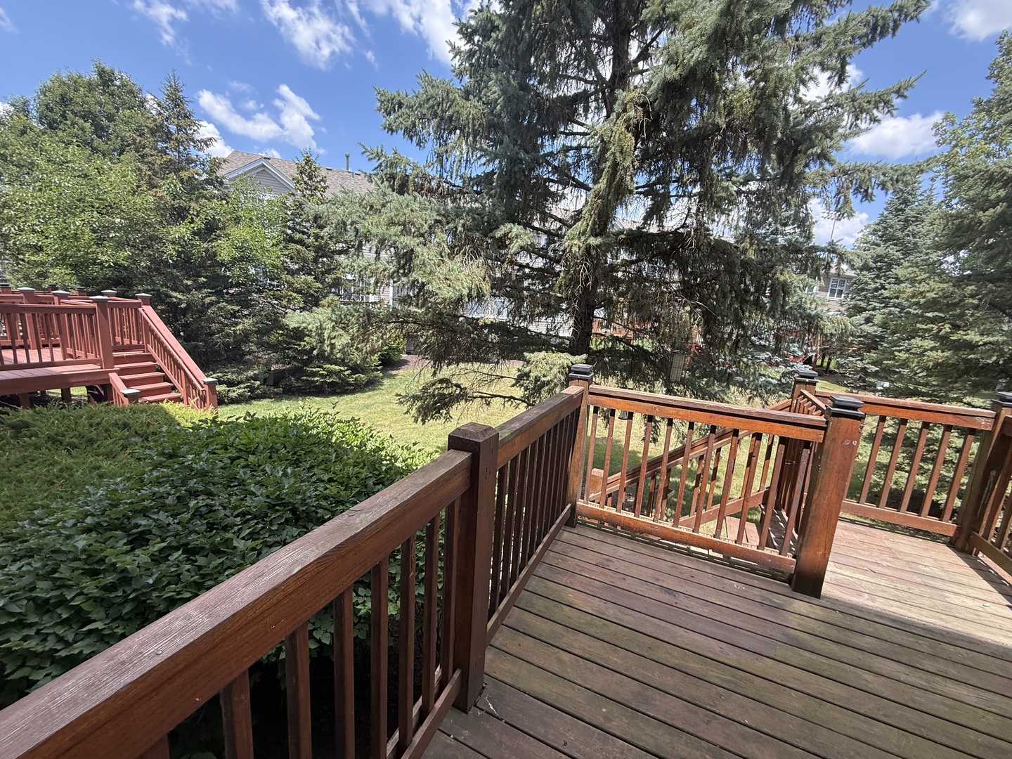 2340 Hudson Circle Aurora, IL 60502 - Photo 31 of 37 a view of balcony with wooden floor and fence