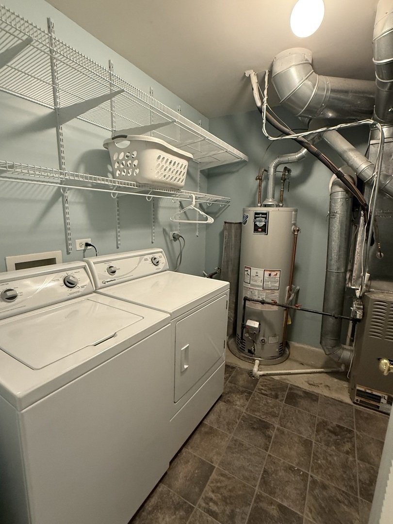 2340 Hudson Circle Aurora, IL 60502 - Photo 35 of 37 a utility room with dryer and washer