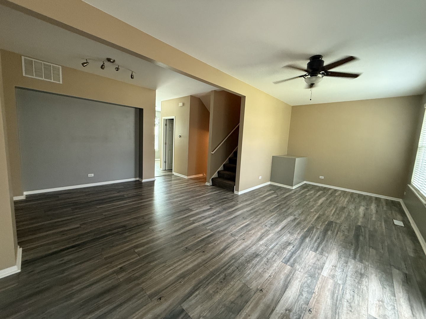 2340 Hudson Circle Aurora, IL 60502 - Photo 6 of 37 wooden floor in an empty room with a window