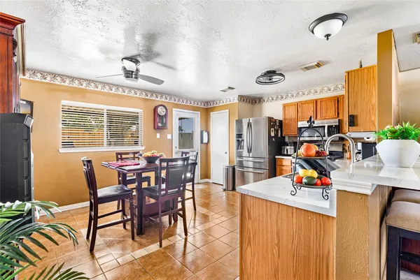 a view of a dining room with furniture window and outside view