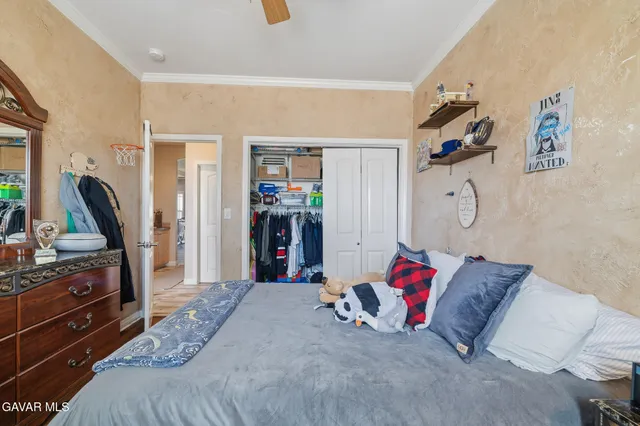 a bed room with a bed and a couch