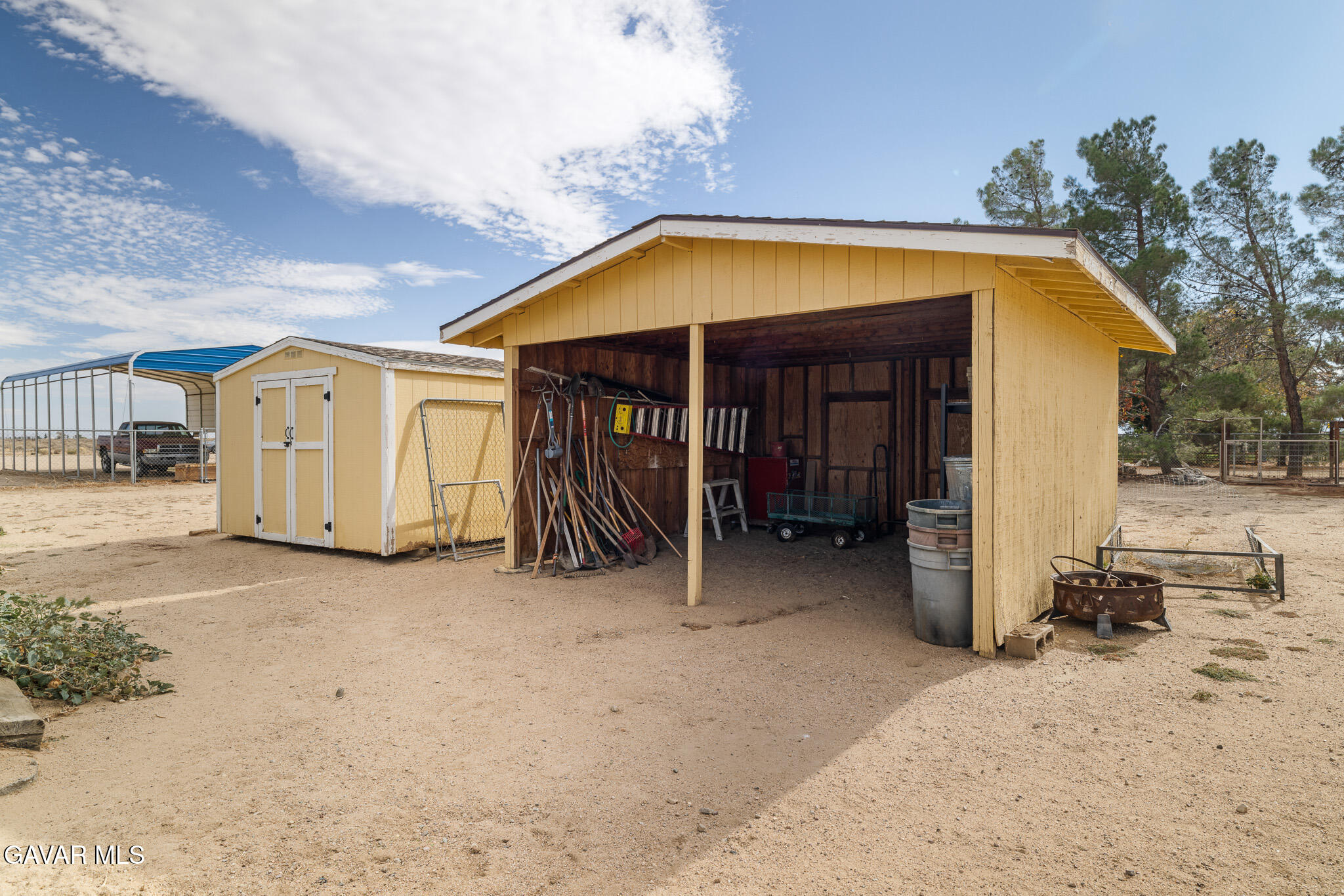 49945 80th Street West Lancaster, CA 93536 - Photo 30 of 38 a view of a house with backyard