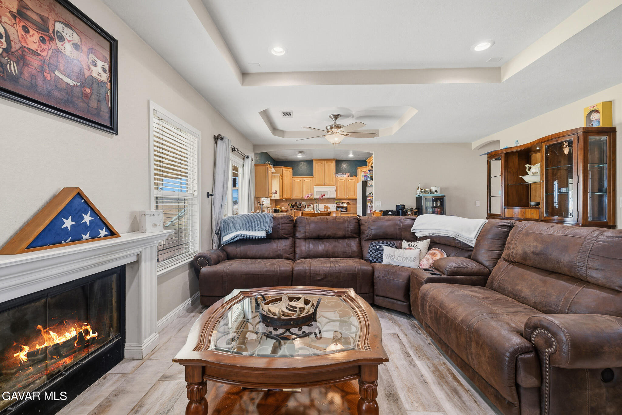 49945 80th Street West Lancaster, CA 93536 - Photo 6 of 38 a living room with furniture and a fireplace