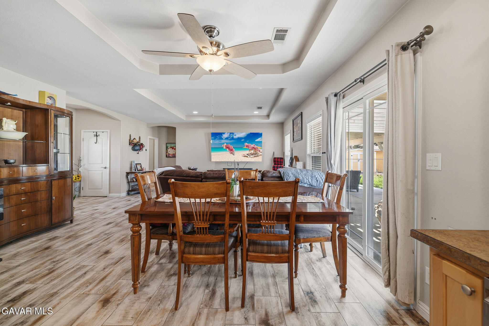 49945 80th Street West Lancaster, CA 93536 - Photo 9 of 38 a view of a dining room with furniture window and wooden floor