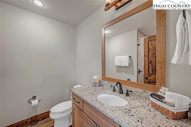 a bed room with a bed and a dresser