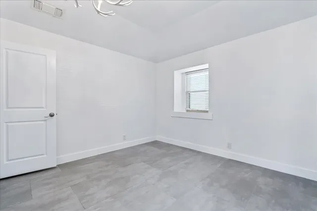 an empty room with a window