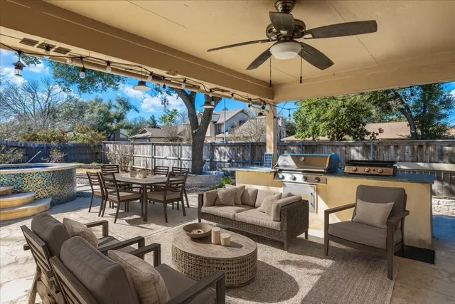 a view of a patio with couches table and chairs