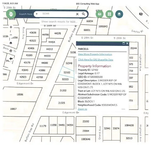 a view of a yard with a trampoline