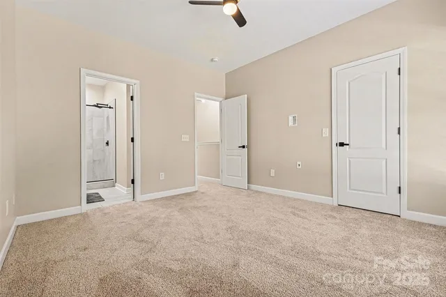 a bathroom with a double vanity sink mirror and shower