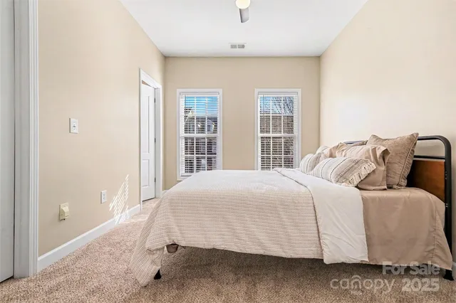 a view of a patio with chair and tables