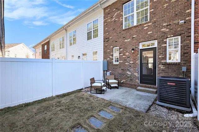 a view of balcony with furniture