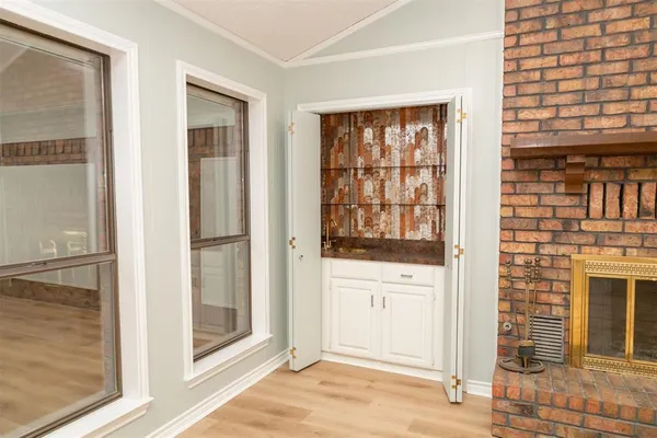 a view of an entryway with a fireplace