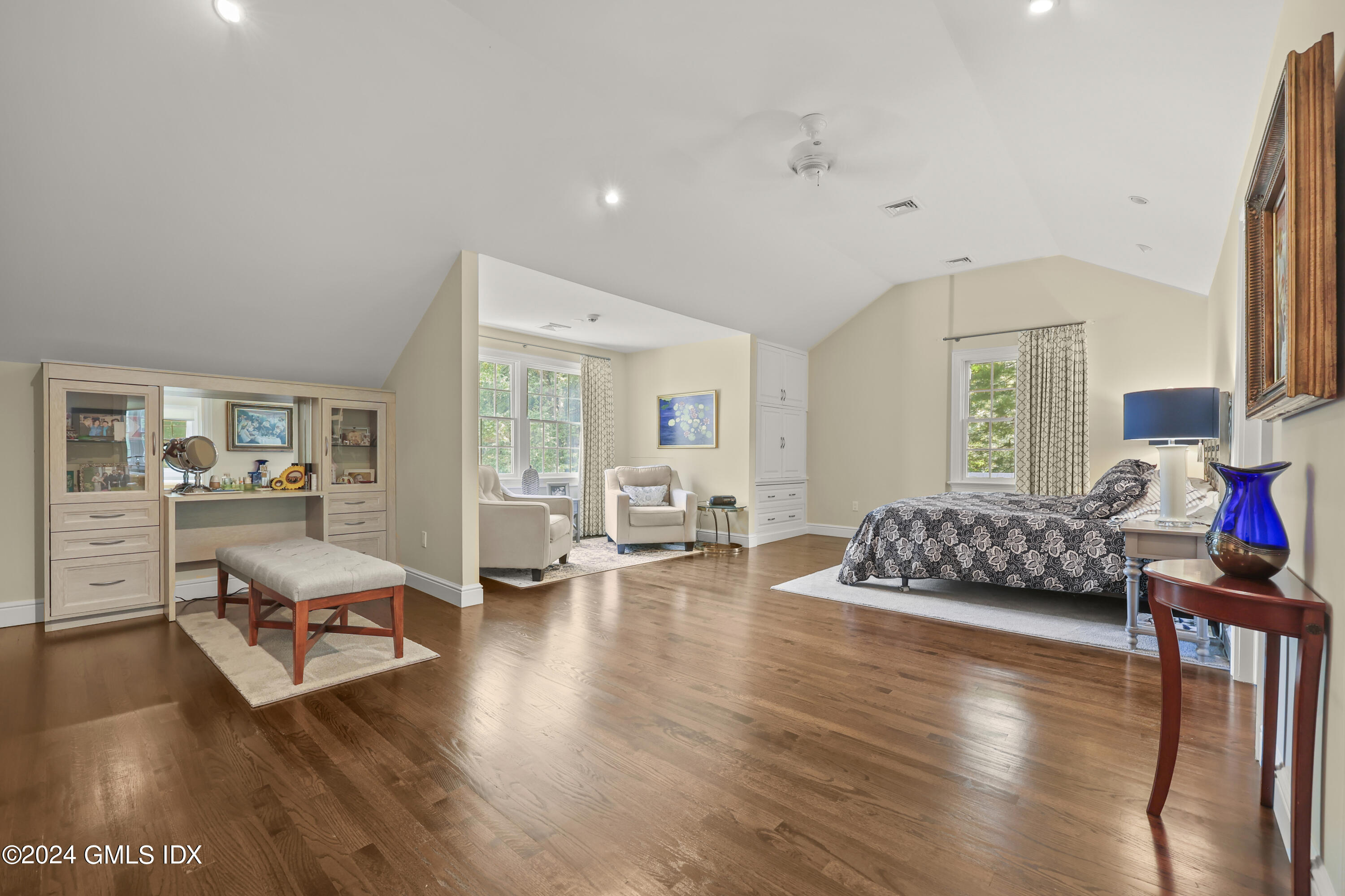 56 Flint Rock Road Stamford, CT 06903 - Photo 15 of 28 a living room with furniture and a wooden floor