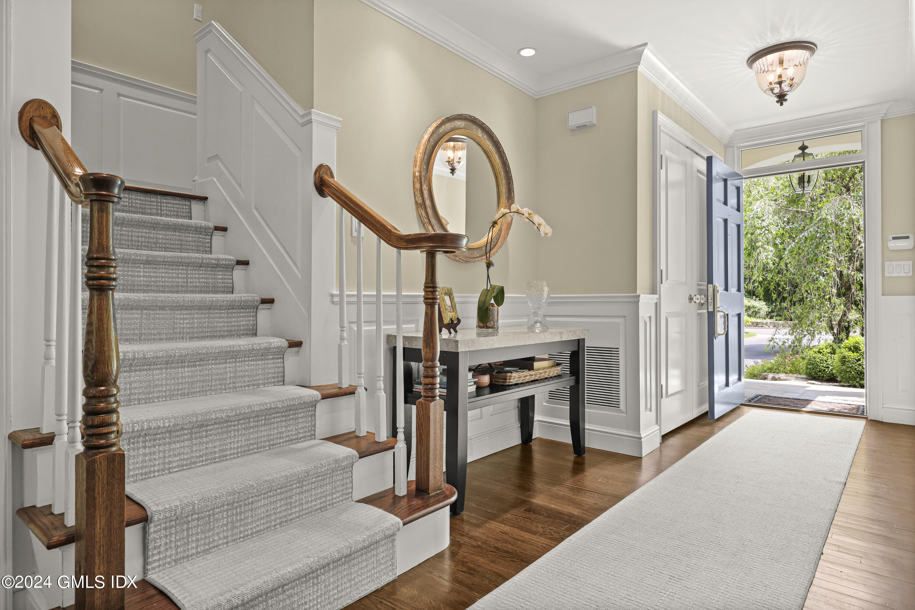 56 Flint Rock Road Stamford, CT 06903 - Photo 5 of 28 a view of entryway and hall with wooden floor