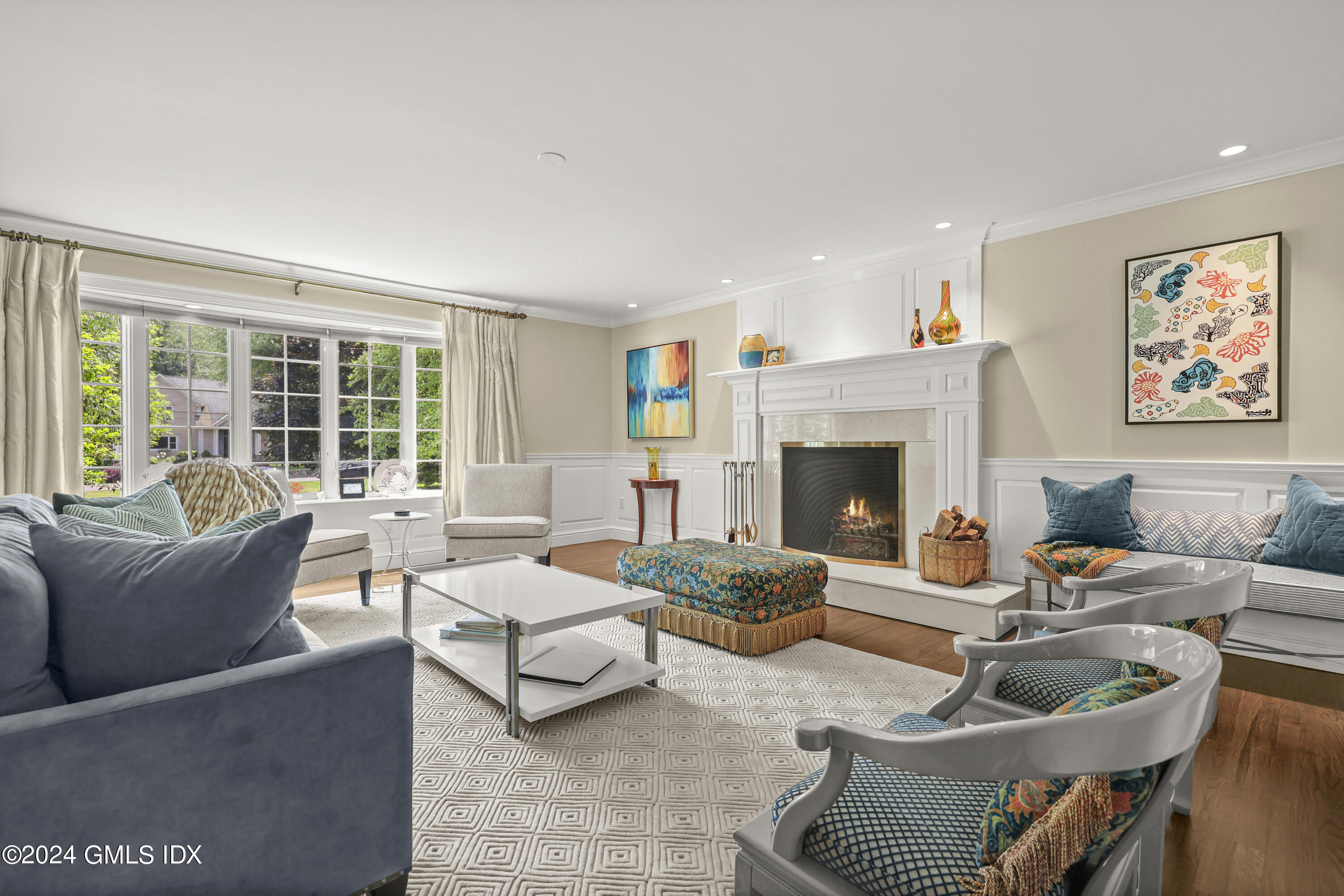 56 Flint Rock Road Stamford, CT 06903 - Photo 6 of 28 a living room with furniture and a fireplace