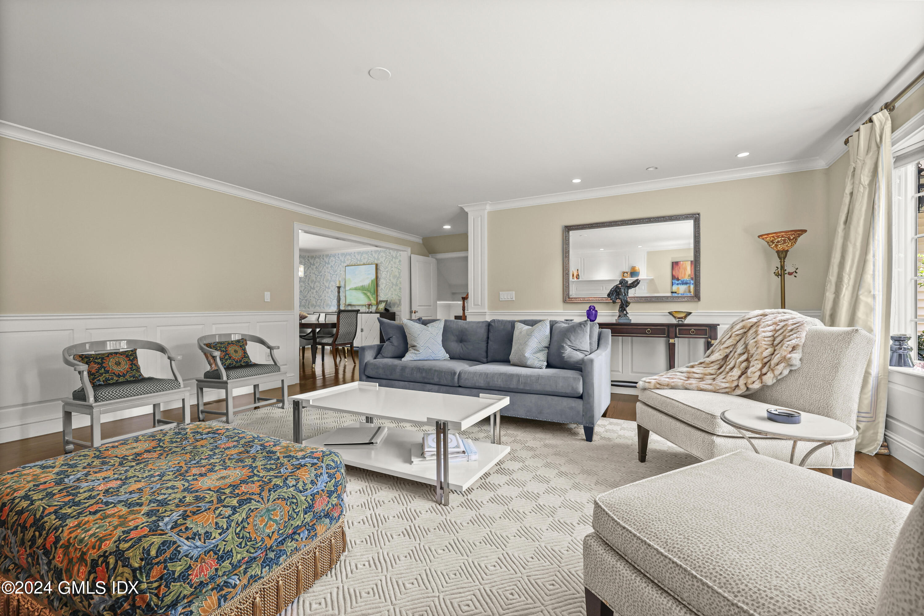 56 Flint Rock Road Stamford, CT 06903 - Photo 7 of 28 a living room with furniture and a rug