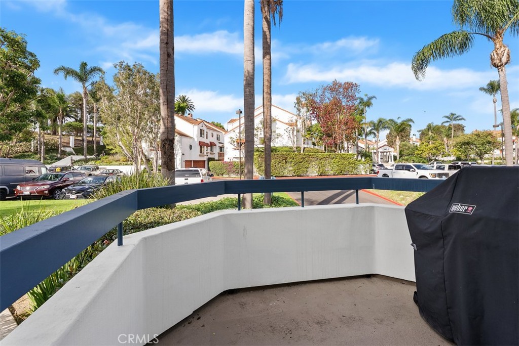 19502 Ranch Lane, Unit 112 Huntington Beach, CA 92648 - Photo 18 of 45 a view of a swimming pool with a lounge chair