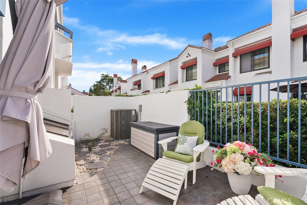 19502 Ranch Lane, Unit 112 Huntington Beach, CA 92648 - Photo 20 of 45 a building outdoor space with seating