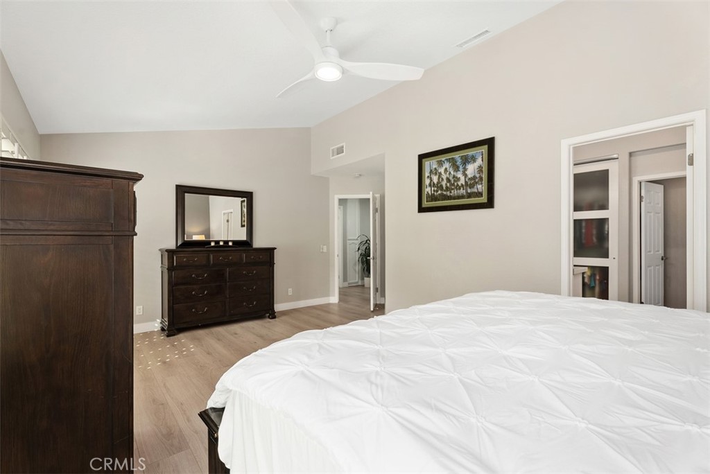 19502 Ranch Lane, Unit 112 Huntington Beach, CA 92648 - Photo 25 of 45 a large bed in a white room