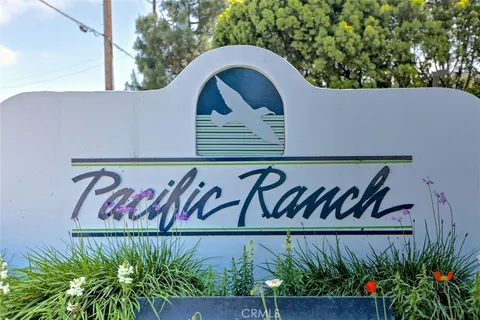 a view of outdoor space with plants and flowers